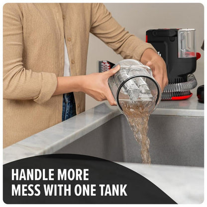 Handle more mess with one tank image showcasing the dirty water tank being emptied into the sink. 